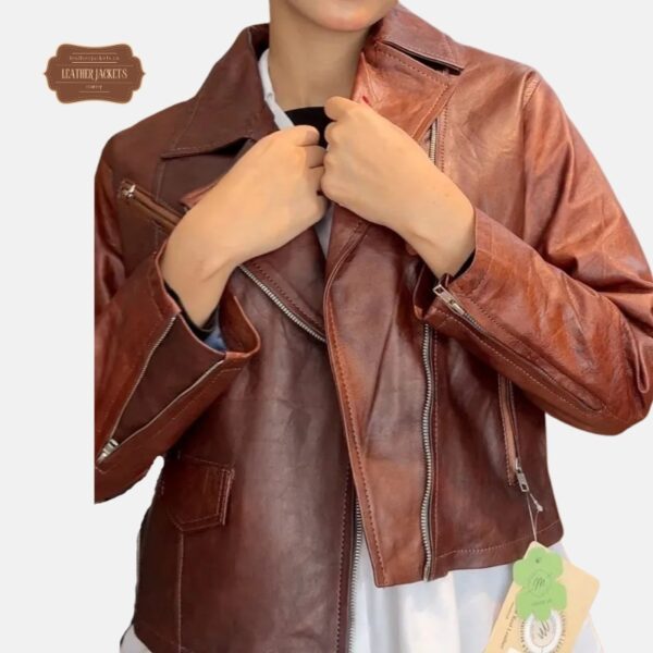 women wearing brown biker jacket side pose 1